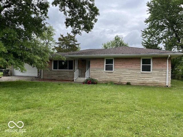 8045 Briarwood Dr, Indianapolis, IN 46227 - single story home with stone siding, a front lawn, an attached garage, roof with shingles, and concrete driveway