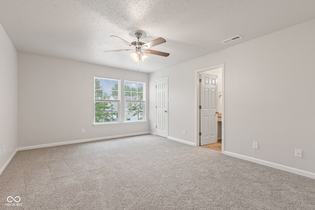 2270 Collins Way, Greenfield, IN 46140 - unfurnished bedroom with carpet floors, a textured ceiling, and a ceiling fan