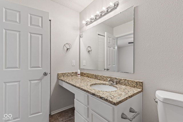2270 Collins Way, Greenfield, IN 46140 - half bathroom with vanity and tile patterned floors