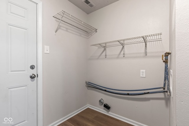 2270 Collins Way, Greenfield, IN 46140 - laundry room with dark wood-style floors and baseboards