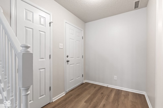 2270 Collins Way, Greenfield, IN 46140 - entryway with dark wood-style floors and a textured ceiling