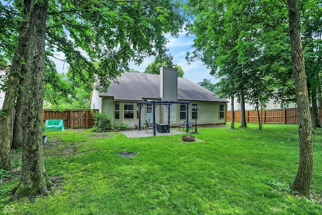 1264 Black Oak Dr, Greenwood, IN 46143 - rear view of house featuring a pergola, a chimney, a patio, an outdoor fire pit, and a shingled roof