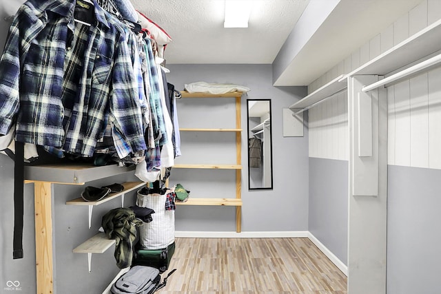 1264 Black Oak Dr, Greenwood, IN 46143 - walk in closet with wood finished floors