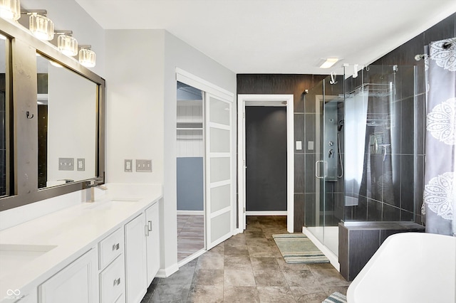 1264 Black Oak Dr, Greenwood, IN 46143 - bathroom featuring a shower stall, double vanity, and a freestanding tub