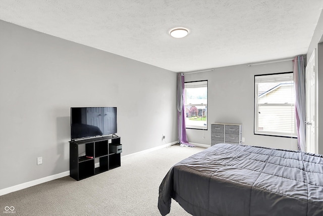 1264 Black Oak Dr, Greenwood, IN 46143 - bedroom featuring carpet flooring, a textured ceiling, and baseboards