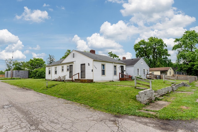 3065 N Colorado Ave, Indianapolis, IN 46218 - view of front facade featuring a chimney