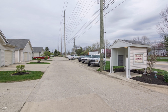 8410 Hague Rd Unit 5, Indianapolis, IN 46256 - view of asphalt street featuring traffic signs