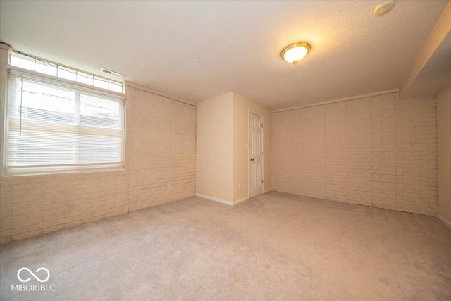 8410 Hague Rd Unit 5, Indianapolis, IN 46256 - empty room with brick wall, carpet, and a smoke detector