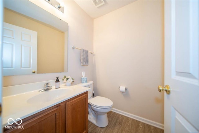 8410 Hague Rd Unit 5, Indianapolis, IN 46256 - half bathroom with wood finished floors and vanity
