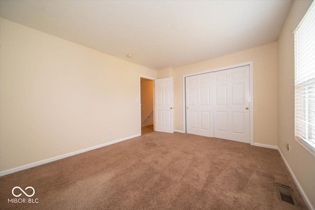 8410 Hague Rd Unit 5, Indianapolis, IN 46256 - unfurnished bedroom featuring carpet and a closet