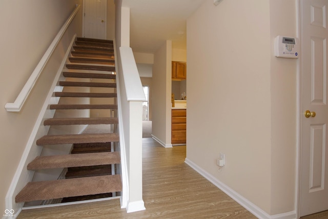 8410 Hague Rd Unit 5, Indianapolis, IN 46256 - staircase with wood finished floors and baseboards