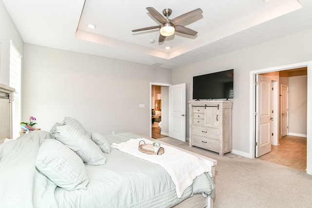 8263 Bryce Blvd, Pendleton, IN 46064 - bedroom with a raised ceiling, recessed lighting, light carpet, ceiling fan, and baseboards