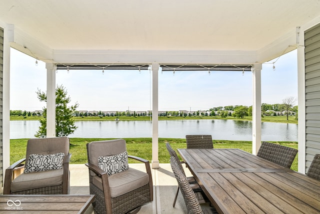 8263 Bryce Blvd, Pendleton, IN 46064 - sunroom / solarium with a water view, outdoor dining space, and healthy amount of natural light