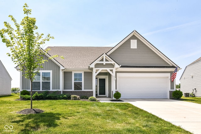 8263 Bryce Blvd, Pendleton, IN 46064 - view of front of property with driveway, board and batten siding, central air condition unit, a front yard, and a shingled roof