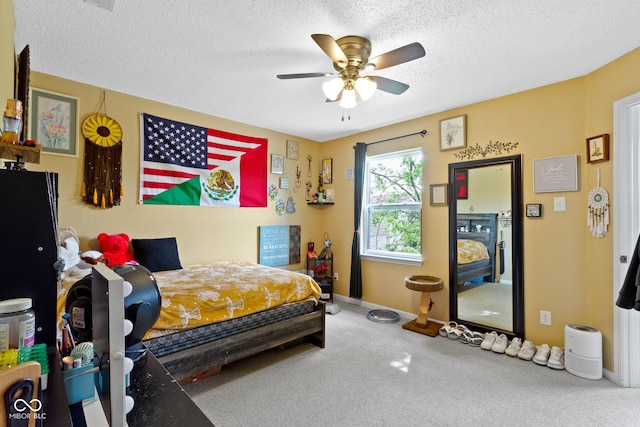 3362 Pavetto Ln, Indianapolis, IN 46203 - carpeted bedroom featuring a textured ceiling and ceiling fan