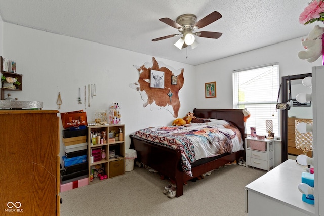 3362 Pavetto Ln, Indianapolis, IN 46203 - carpeted bedroom featuring a textured ceiling and a ceiling fan