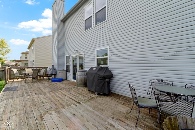 3362 Pavetto Ln, Indianapolis, IN 46203 - wooden deck featuring area for grilling and outdoor dining area