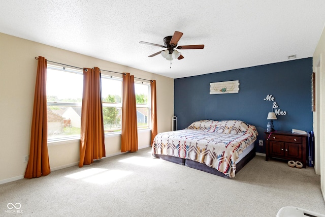 3362 Pavetto Ln, Indianapolis, IN 46203 - carpeted bedroom featuring a textured ceiling and ceiling fan