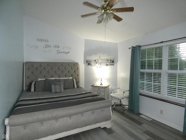 6714 Colleens Way, Indianapolis, IN 46221 - bedroom with wood finished floors, baseboards, and ceiling fan