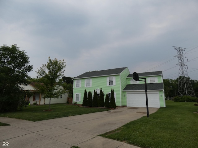 6714 Colleens Way, Indianapolis, IN 46221 - view of front of home featuring a front lawn, driveway, and a garage