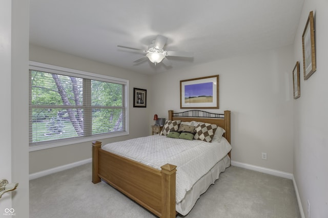2553 Forest Hills Blvd, Greenwood, IN 46143 - bedroom with light colored carpet, baseboards, and ceiling fan