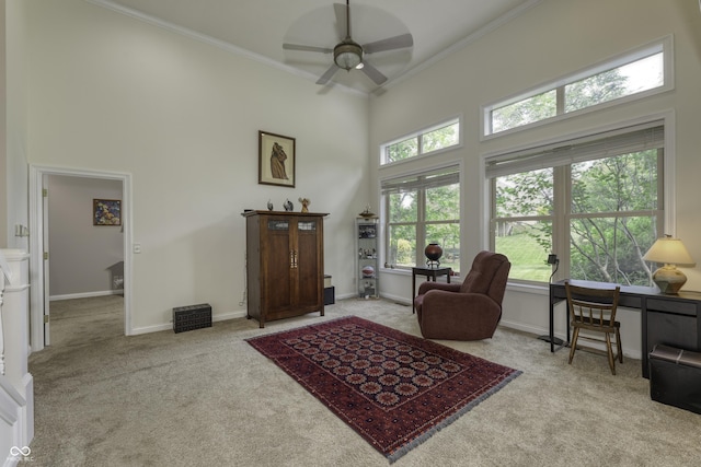 2553 Forest Hills Blvd, Greenwood, IN 46143 - living area featuring a high ceiling, carpet floors, a ceiling fan, ornamental molding, and baseboards