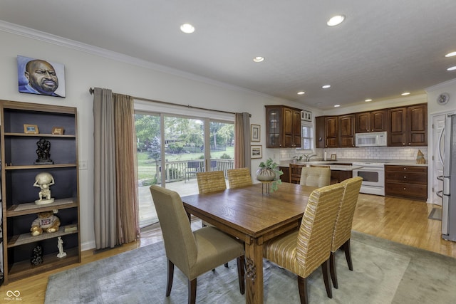 2553 Forest Hills Blvd, Greenwood, IN 46143 - dining room featuring recessed lighting, ornamental molding, and light wood-style flooring