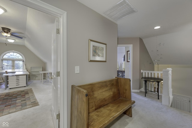 2553 Forest Hills Blvd, Greenwood, IN 46143 - sitting room featuring lofted ceiling, an upstairs landing, light colored carpet, a ceiling fan, and baseboards
