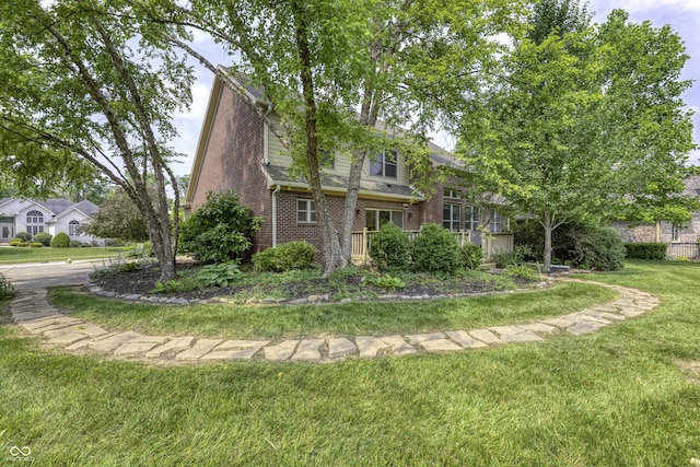 2553 Forest Hills Blvd, Greenwood, IN 46143 - view of front of home with brick siding and a front yard