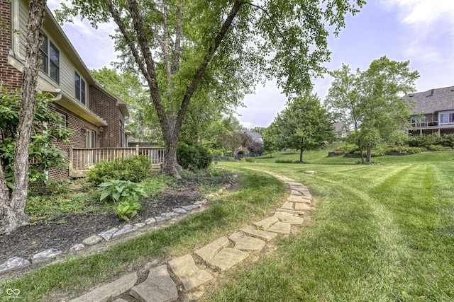 2553 Forest Hills Blvd, Greenwood, IN 46143 - view of grassy yard with a deck