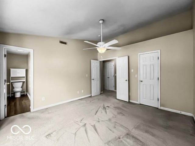 7211 Topp Creek Ct, Indianapolis, IN 46214 - unfurnished bedroom with carpet, ensuite bath, and two closets