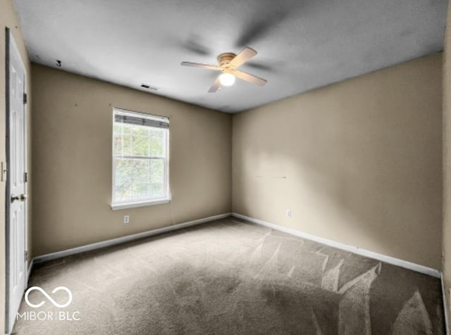 7211 Topp Creek Ct, Indianapolis, IN 46214 - empty room featuring a ceiling fan and carpet floors