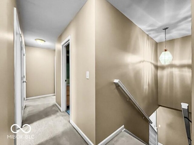 7211 Topp Creek Ct, Indianapolis, IN 46214 - staircase featuring carpet and baseboards