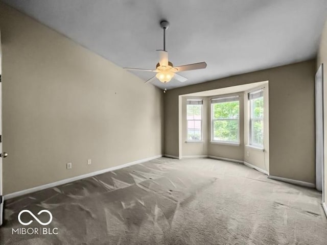 7211 Topp Creek Ct, Indianapolis, IN 46214 - empty room featuring a ceiling fan and carpet
