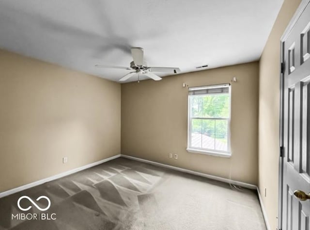 7211 Topp Creek Ct, Indianapolis, IN 46214 - carpeted spare room with ceiling fan and baseboards