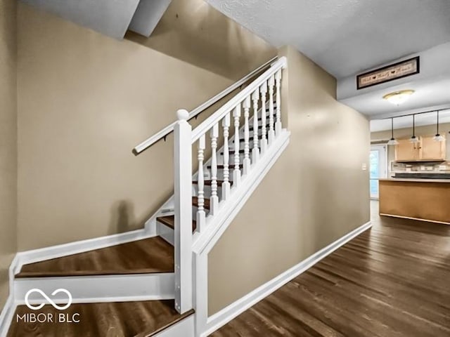 7211 Topp Creek Ct, Indianapolis, IN 46214 - staircase featuring wood finished floors
