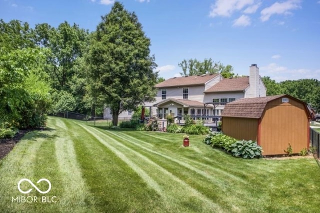 7211 Topp Creek Ct, Indianapolis, IN 46214 - view of yard featuring a storage unit