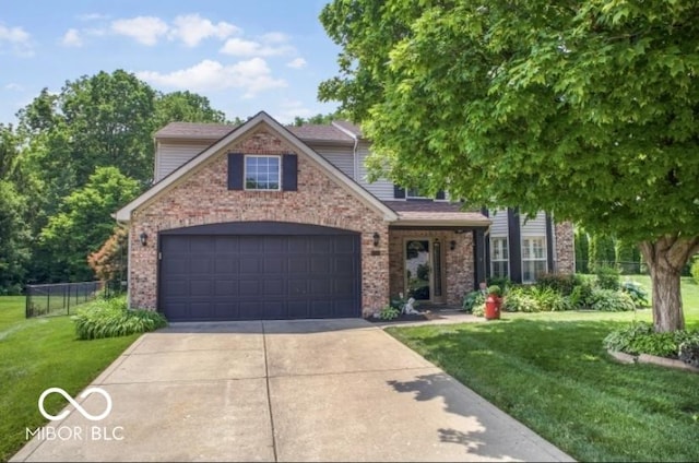 7211 Topp Creek Ct, Indianapolis, IN 46214 - view of front facade with driveway, a garage, and brick siding