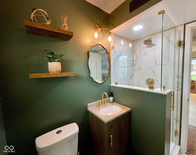 3520 Lantern Ln, Columbus, IN 47203 - bathroom with vanity, a walk in shower, and toilet