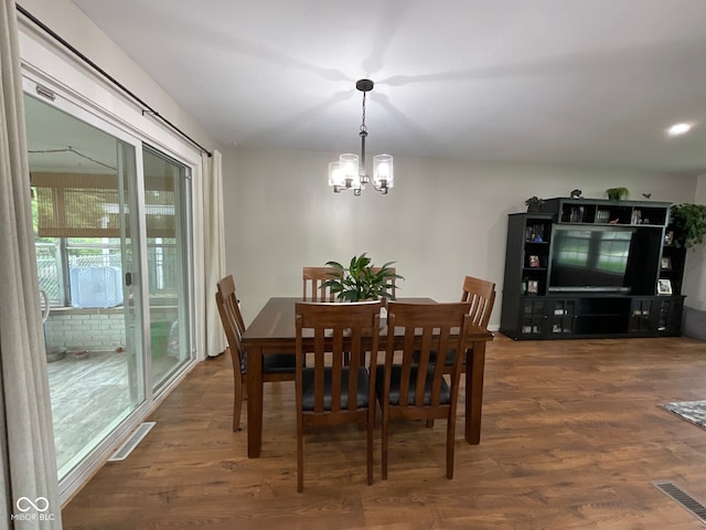 3520 Lantern Ln, Columbus, IN 47203 - dining room featuring a chandelier and wood finished floors