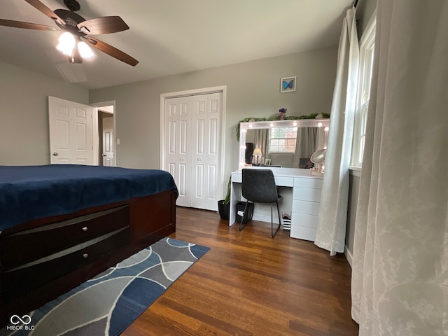 3520 Lantern Ln, Columbus, IN 47203 - bedroom featuring dark wood finished floors, a desk, a closet, and ceiling fan