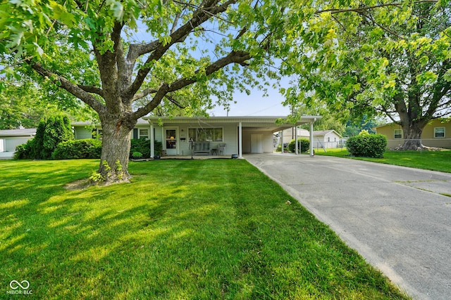 623 Circle Ct, Whiteland, IN 46184 - ranch-style home featuring concrete driveway, an attached carport, and a porch