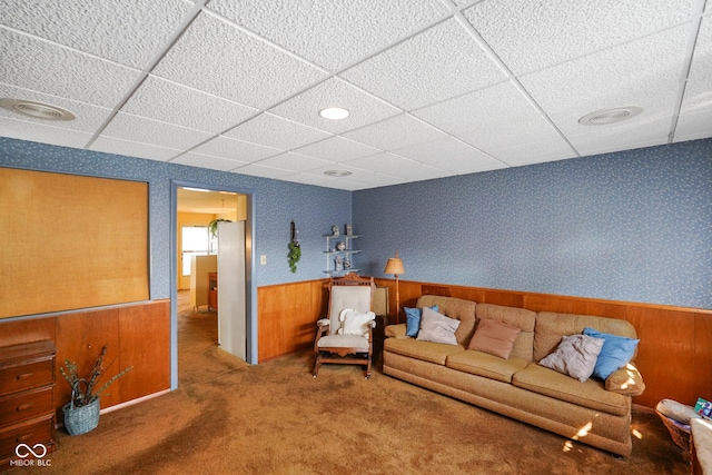 623 Circle Ct, Whiteland, IN 46184 - living area featuring a drop ceiling, carpet floors, a wainscoted wall, and wooden walls