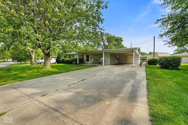 623 Circle Ct, Whiteland, IN 46184 - single story home with concrete driveway, a front lawn, and a carport