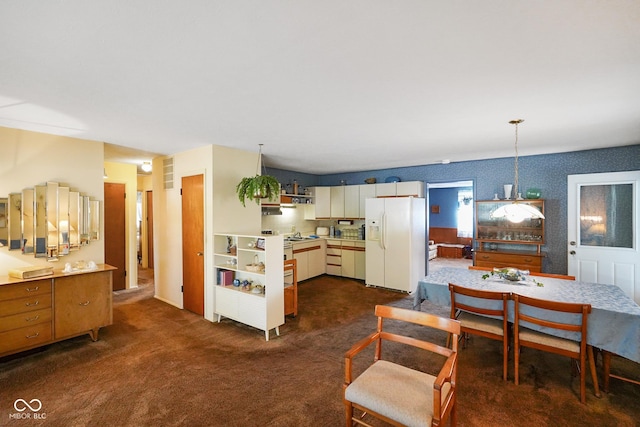 623 Circle Ct, Whiteland, IN 46184 - dining area with dark colored carpet