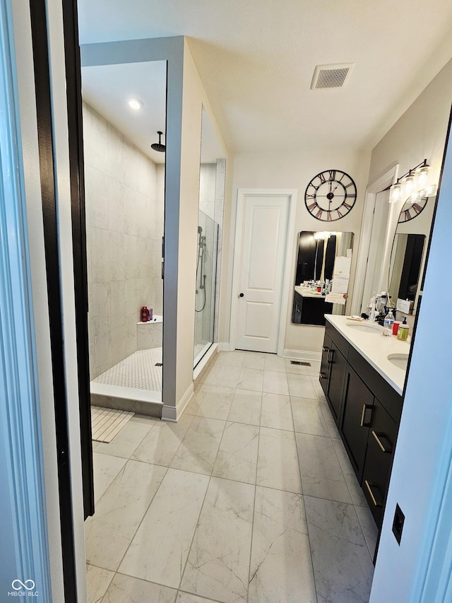 5686 Ellie Ct, Noblesville, IN 46062 - full bathroom with marble finish floors, double vanity, a stall shower, and baseboards