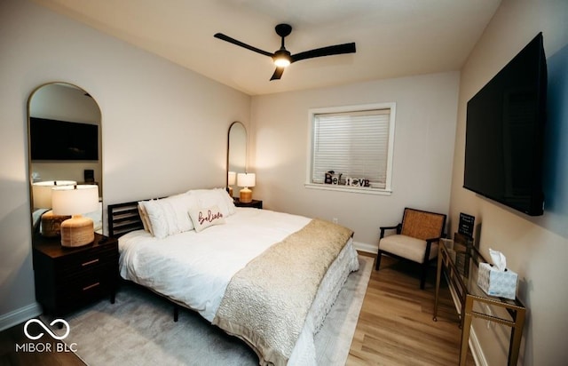 5686 Ellie Ct, Noblesville, IN 46062 - bedroom featuring light wood-style flooring, baseboards, and ceiling fan
