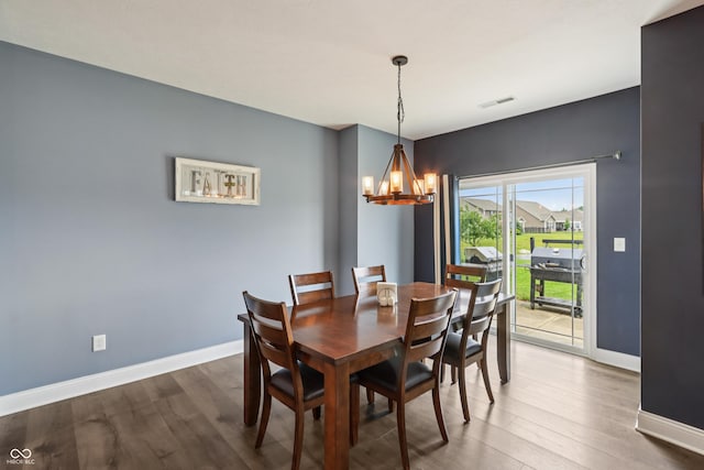 1893 Devonshire Ave, Avon, IN 46123 - dining room with a chandelier, baseboards, and wood finished floors