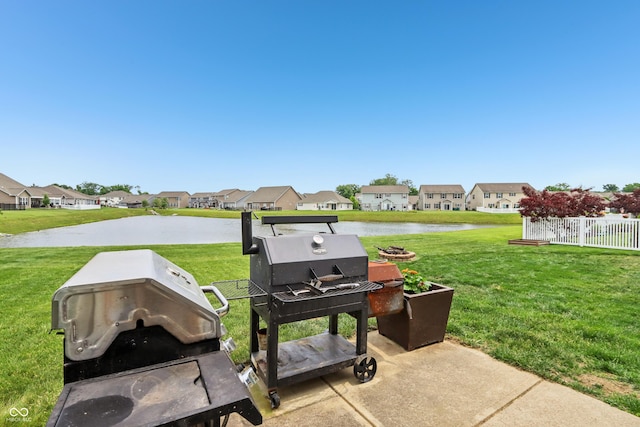 1893 Devonshire Ave, Avon, IN 46123 - view of patio featuring a residential view, a water view, and area for grilling