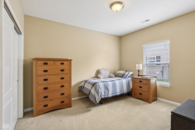 1893 Devonshire Ave, Avon, IN 46123 - bedroom with light colored carpet, baseboards, and a closet